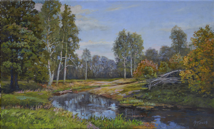 У реки